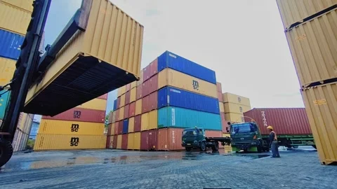 Shipping Container lifting- view of  side loader Stock Footage 312021545