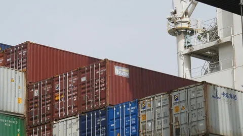 Shipping container ship loading at cargo container port 4k Stock Footage 89788162