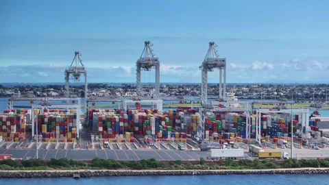 Shipping containers and cranes at Webb Dock in Port Melbourne terminal Stock Footage 277967858