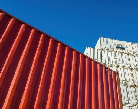 Shipping containers and a deep blue sky Stock Photos