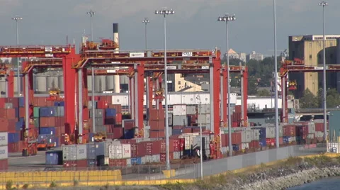 Shipping containers being moved Stockbeeldmateriaal 48341317