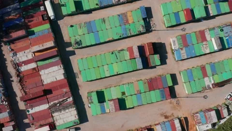 Shipping containers stacked in a holding yard, Top down view Stock Footage 231421661