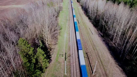 Shipping containers transportation on freight train by railway. Stockbeeldmateriaal 190075875
