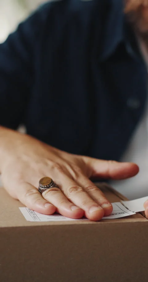 Shipping, hands or man with package sticker for delivery info, packing process Stock Footage 336670346