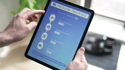 Shipping Package Tracking app on a Tablet Screen Showing the Information Stock Footage 194545503