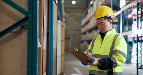 Shipping, scanner and warehouse worker with stock checklist, inventory or Stock Footage 335936569