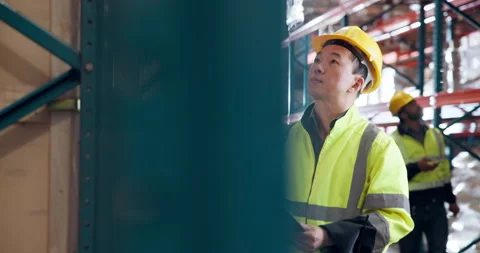 Shipping, writing and warehouse worker with stock checklist, inventory or Stock Footage 335792260