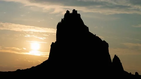 Shiprock Peak at Sunrise, Time Lapse with Colorful Cloudsn, New Mexico, USA Stock Footage 169646699