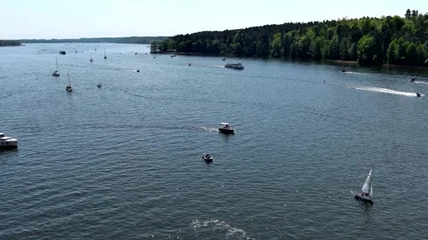 Ships of All Sizes Navigating the River Video stock 297093001