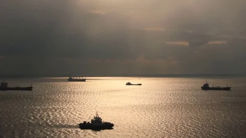 Ships anchored in variable weather Video stock 72985057