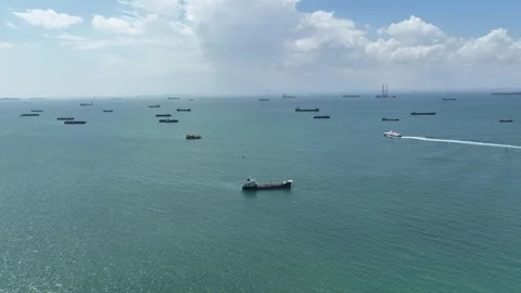Ships anchoring in the waters between Batam and Singapore Stock Footage 250554043