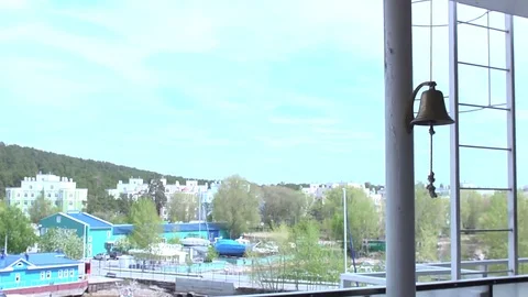 A ship's bell hangs on a pole Stock Footage 75779250