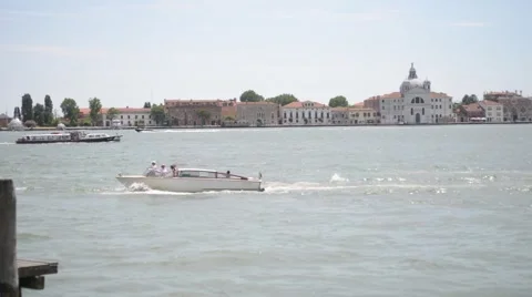 Ships float along the pier on the waterfront of San Marco in Venice. Stock Footage 52104693