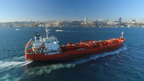 Ships floating Bosphorus blue water sunny day. Aerial drone view on sunset in Stock Footage 87785017