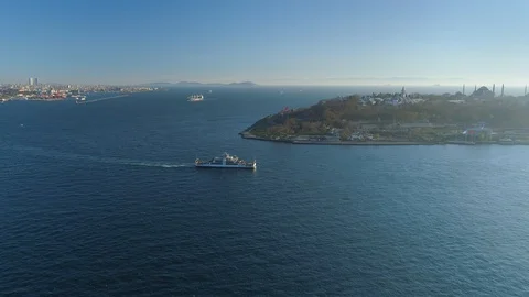 Ships floating Bosphorus blue water sunny day. Aerial drone view on sunset in Stock Footage 87785396