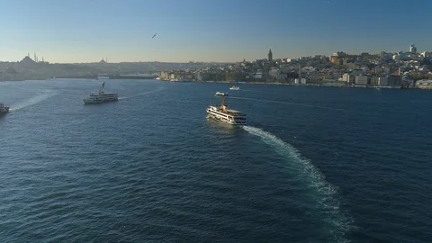 Ships floating Bosphorus blue water sunny day. Aerial drone view on sunset in Stock Footage 87786382