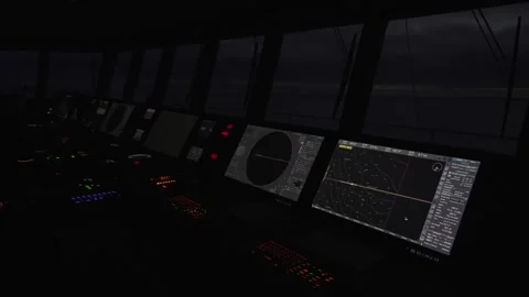 Ship's navigation bridge at night. Control panel is highlighted Vidéo 274386499