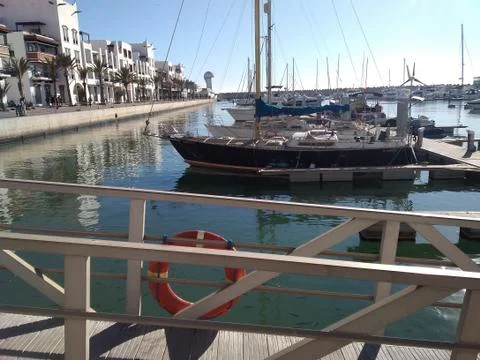 Ships parked on the Agadir Marina around the tourist stays. Stock Photos