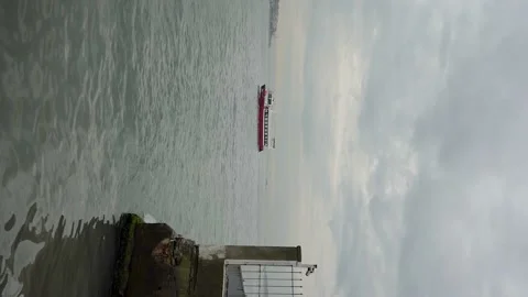 Ships pass through the Bosphorus - Vertical - 4k 100 fps Video stock 196190459