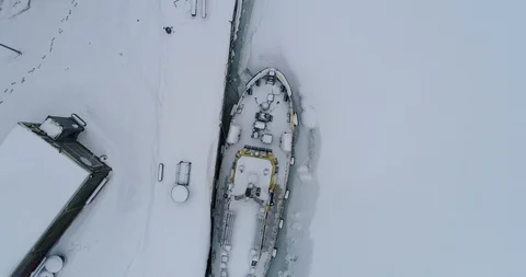 Ships at the pier in the ice Stock Footage 86898693