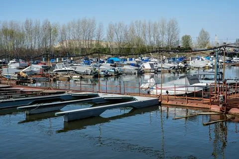Ships in the spring on the river in the docks Stock Photos