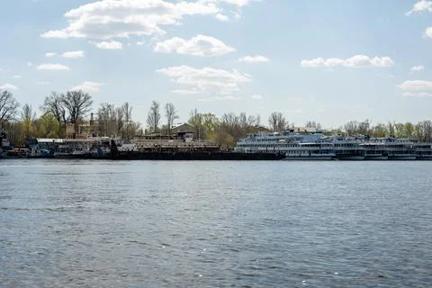 Ships in the spring on the river in the docks Stock Photos