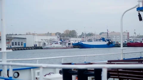 Ships sways on the waves in slow motion in docks, pier in the port, 4k 60p Stock Footage 166520002