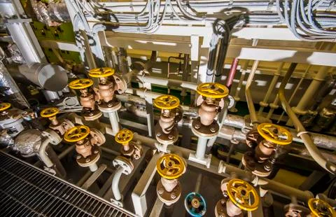 Ships valves, main engine - engineering interior Stock Photos