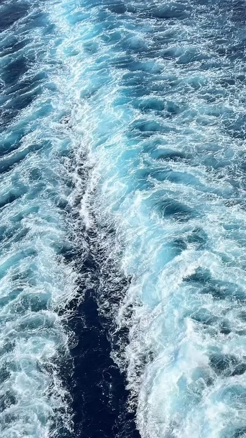 Ship's Wake Cutting Through Ocean Waters Leaving Dramatic White Trail Behind Stock Footage 294262187