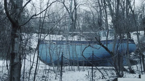 Shipwreck 002 blue in woods behind trees frontal Stock Footage 45673970