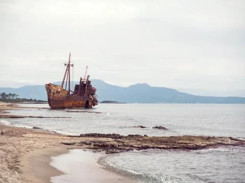Shipwreck in a beach Stock Photos
