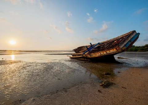 A shipwreck on the beach Stock Photos