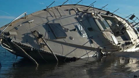 Shipwrecked ship on shore seen up close Stock Footage 130671596