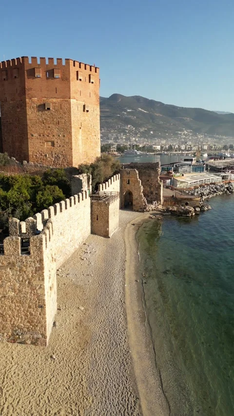 Shipyard Beach and Red Tower in Alanya. Vertical. With Drone shooting. Video stock 234131807
