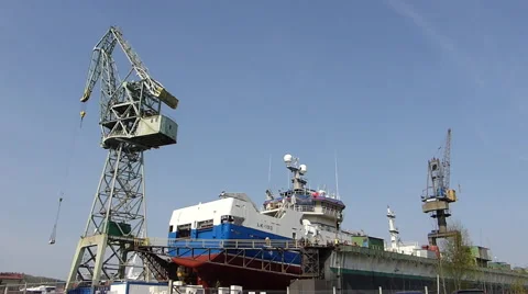 Shipyard crane and dry dock timelapse Stock Footage 49697194