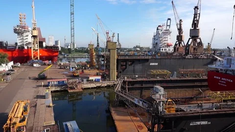 Shipyard crane and dry dock. Gdańsk shipyard. Poland Stock Footage 70836013