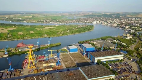 Shipyard on the Danube river, aerial view Stock Footage