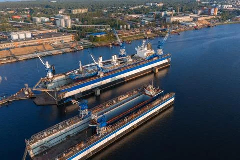 Shipyard with Floating Dry Docks and Blue Cranes in Riga, Latvia Stock Photos