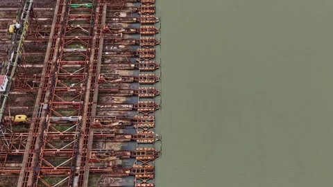 Shipyard with multiple vessels in dry dock for maintenance work 스톡 동영상 337941456