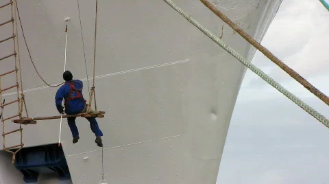 Shipyard worker paint the ship Stock Footage 342625