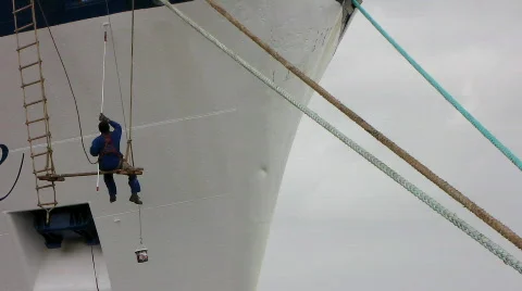 Shipyard worker paint the ship Stock Footage 597072