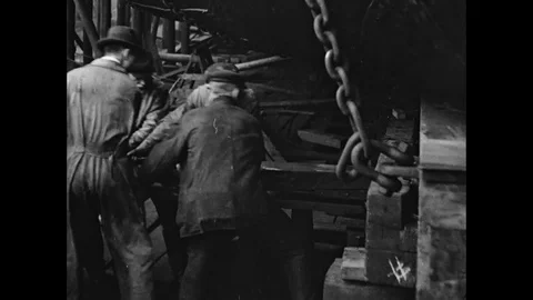 Shipyard Workers Lifting The Ship With Wooden Beams Stock Footage 91453050