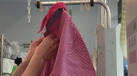 Shirt being placed on hanger Stock Footage 42329743