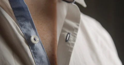 Shirt button man opening and closing slow motion Vídeos de archivo 103493865