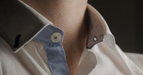 Shirt button man opening and closing slow motion Stock Footage 103493871