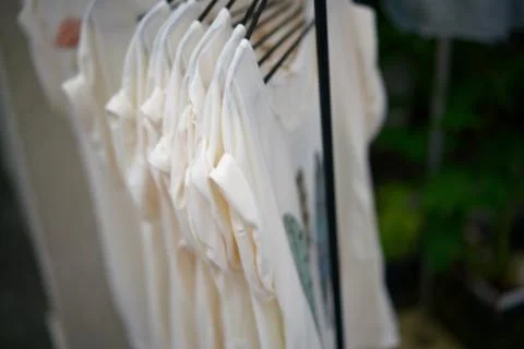 Shirt placed at store front Stock Photos