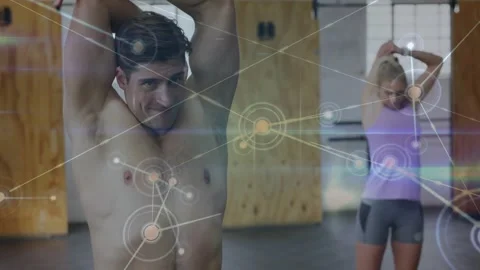 Shirtless man doing overhead stretch activating node network for gym warmup Stock Footage 330917508