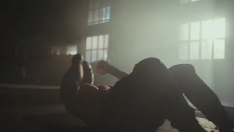 Shirtless man doing sit-ups Stock Footage 236180788