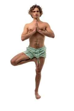 Shirtless man in handstand in studio Stock Photos