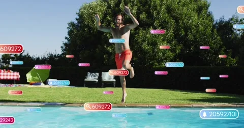 Shirtless man jogging poolside then diving into water clearing floating tech Stock Footage 317206386